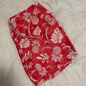 Tommy Brahma swim trunks.